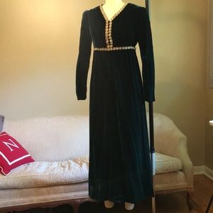 Dark green velvet costume dress with pearl detail